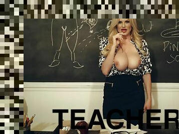 Kinky teacher bares boobs at the chalkboard