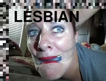 Lesbian femdom with busty redhead mature in bondage