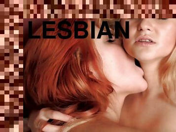 Two cute babes playing lesbian games - redhead and blonde