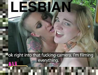 Tattooed fake taxi driver makes blonde lesbian cum in car