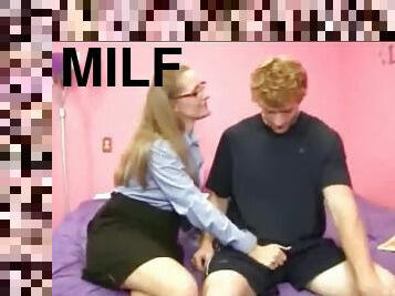 Young guy gets a wild milf handjob