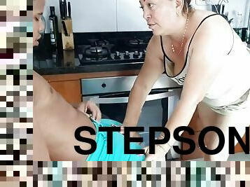 I suck my stepsons cock in the kitchen, I love it