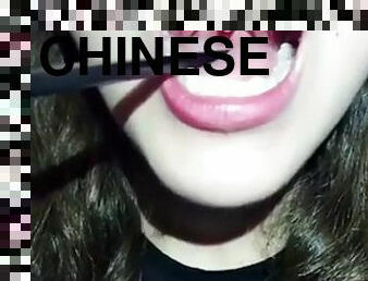Chinese girl uvula (was she swallowing with her open mouth at 0:56?)