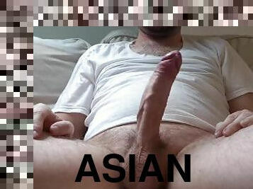On The Couch Stroking To Some Asian Porn