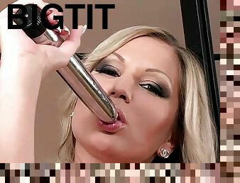 Glam girl masturbates with long silver dildo