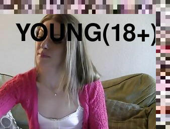 Young sexy blonde while chatting on his pc
