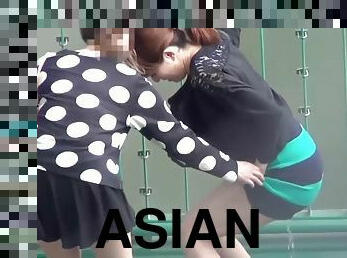 Asian slut urinating