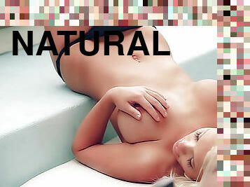 Voluptuous blonde models natural tits