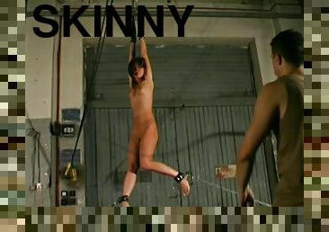 Skinny girl spanked in BDSM film