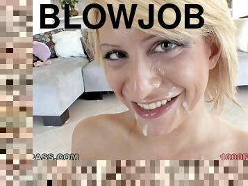 Cocksucker smiles with jizz on her face