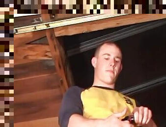 Perched in the rafters of an old garage, Cory Woodall strips down and starts stroking his cock. It doesnt take long for a huge drop of cum to fall ...