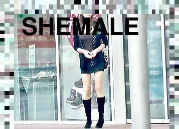 Crossdresser TGirl in short skirt and boots outside