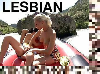 Lesbian threesom on a water raft