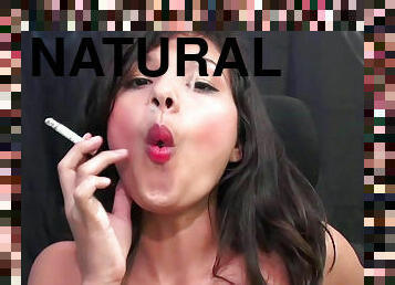 Smoking babe teasing in solo