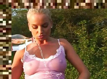 Hot heather gets all nice and wet outdoors