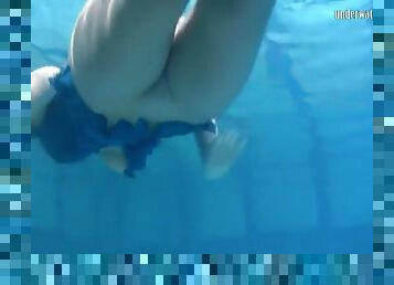 Blonde feher with big firm tits underwater