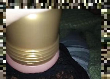 Jerking cock with Flesh Light through fishnets ????