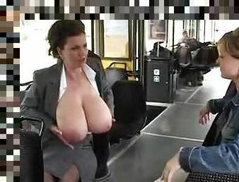 Chick milks her huge tits on a public bus