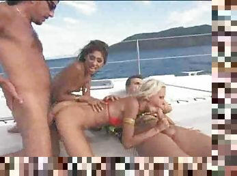 Hot babes boning on the boat and looking good