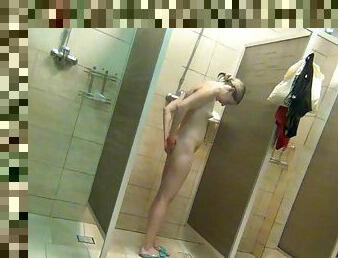 Sexy babe is getting naked in the shower