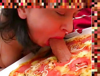 Sexy babe is sucking dick through the pizza