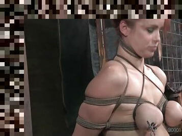 Beautiful redhead tied up for tit torture
