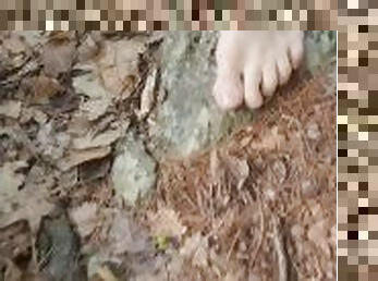 Barefoot walk through the woods. Solo male feet preview