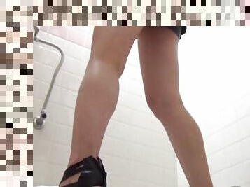 Japanese slut filmed peeing hard through her shorts