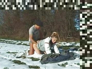 Snow bunny rides cock on the mountainside