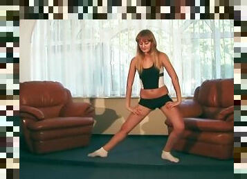 Skintight workout clothes on flexible teen