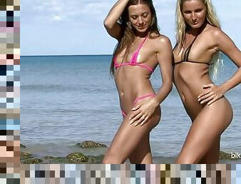 Brunette and blonde model posing in their super sexy bikini