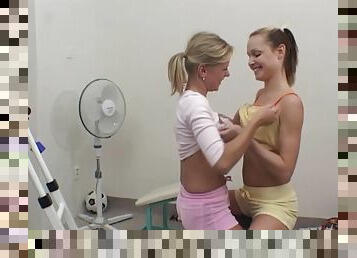 Teen lesbians toy twats in gym