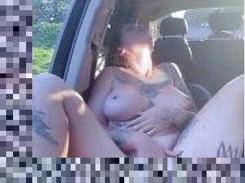 Daring Public Display: Intense Anal Ride in Car Alongside Bustling Street