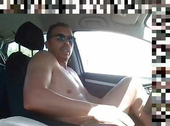 Totaly Nude behind the wheel jerk driving through the streets of LA