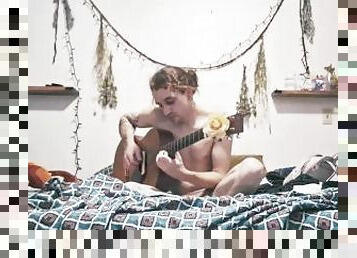 Your boyfriend playing music on your bed naked because he misses you