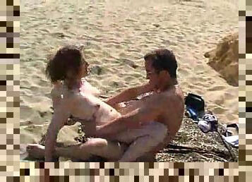 Babe stuffed with cock on public beach