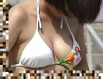 Japanese girls at the beach with big tits