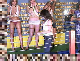 Wild party girls get topless and naked during a wet t-shirt contest